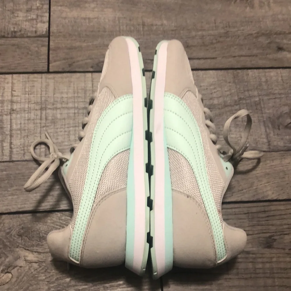 Puma retro runner sneakers in mint and light grey with soft foam support inserts